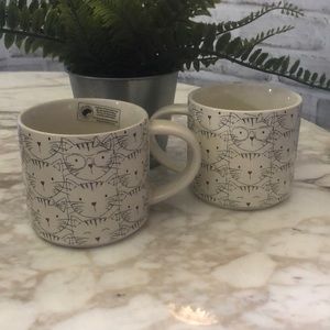 New set of 2 John Bartlett cat mugs